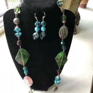 Necklace and earrings.